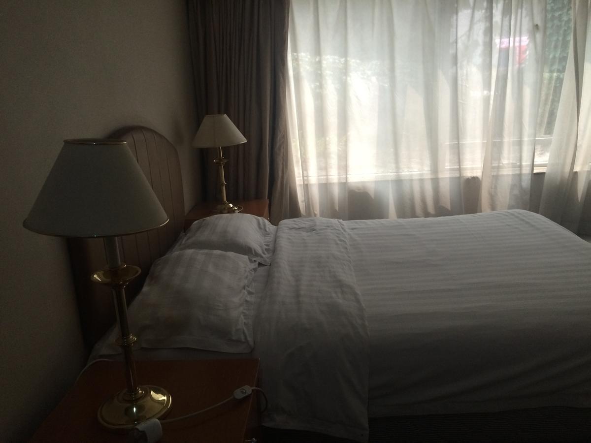 Beijing New World Centre Aparthotel Zewnętrze zdjęcie